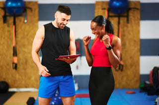 Personal trainer with client